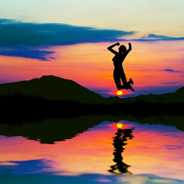 healthy-woman-jumping-with-sun-background_1160-174